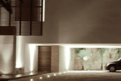 Garage and driveway with low-level lighting